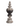 Decorative finial with intricate design on a white background