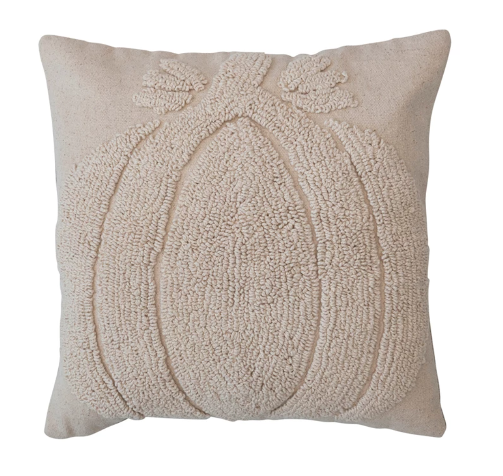 Elevate your fall decor with our 18-inch Square Cotton Slub Tufted Pillow featuring a charming pumpkin design and a chambray back in a warm cream color. Intricately crafted with attention to detail, this pillow effortlessly blends cozy textures with seasonal motifs, adding a touch of autumnal charm to your store. This pillow brings a rustic and festive element, creating a welcoming atmosphere for the harvest season.