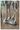 A faux marble effect standing giraffe statue made from stone powder and resin.