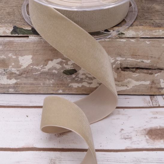 Measuring 1.5" wide and 11 yards long, this luxurious ribbon features a soft, rich texture that adds depth and sophistication to any creation. Perfect for gift wrapping, floral arrangements, or DIY crafts, its versatile hue complements a variety of decor styles. Elevate your designs with this exquisite ribbon, ideal for adding a cozy and elegant flair to your seasonal and everyday projects!