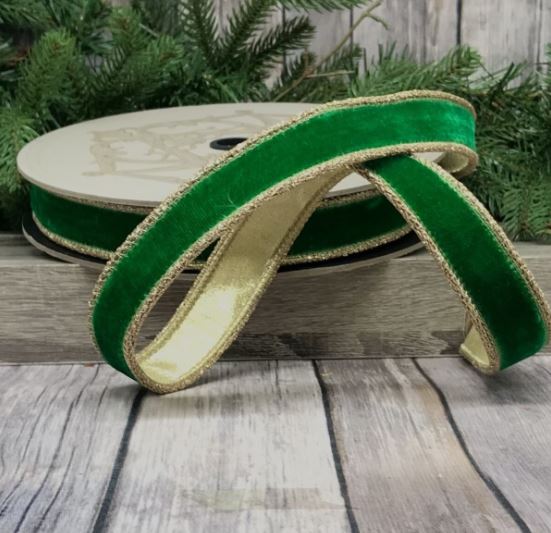 Measuring 1" wide and 10 yards long, this stunning ribbon features a soft velvet texture accented by shimmering gold glitter trim. Perfect for gift wrapping, crafting, or enhancing floral arrangements, its rich color and sparkling detail make it a versatile choice for both festive and everyday occasions. Elevate your decor and create eye-catching designs with this luxurious ribbon that beautifully combines elegance and sparkle!