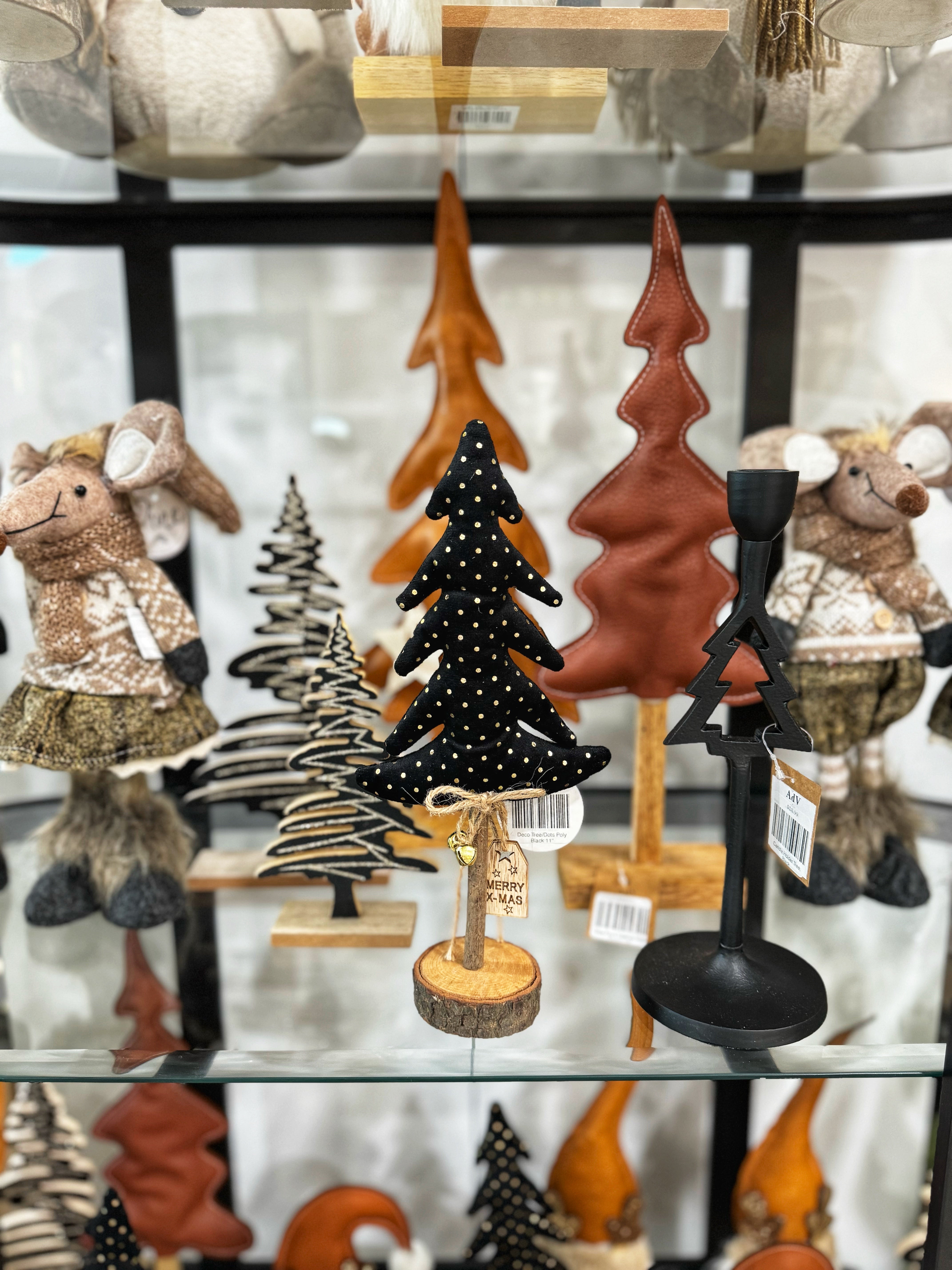 These charming trees feature a beautifully crafted design, perfect for adding a festive touch to your home. Whether displayed on mantels, tabletops, or as part of a holiday centerpiece, they bring a cozy and cheerful vibe to any space. Their versatile styles complement both traditional and contemporary decor, making them a delightful addition to your seasonal collection. Celebrate the magic of the season with these enchanting trees that capture the spirit of Christmas!