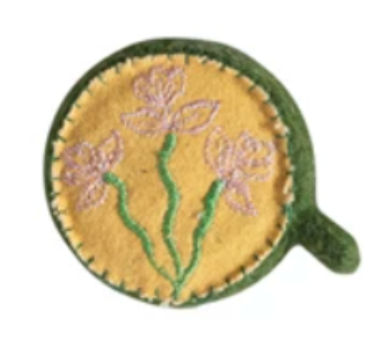 Wool Felt Tape Measure Embroidered patch with floral design on a yellow background