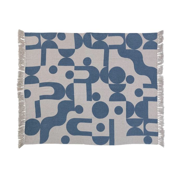 Transform the space with this woven reclaimed cotton blend printed throw with abstract design and fringe in blue and beige. This throw blanket features a woven reclaimed cotton blend that creates a soft and cozy feel. The abstract design adds some contrast and interest to the simple design. The design is captivating and colorful, giving the throw a contemporary and artistic look.