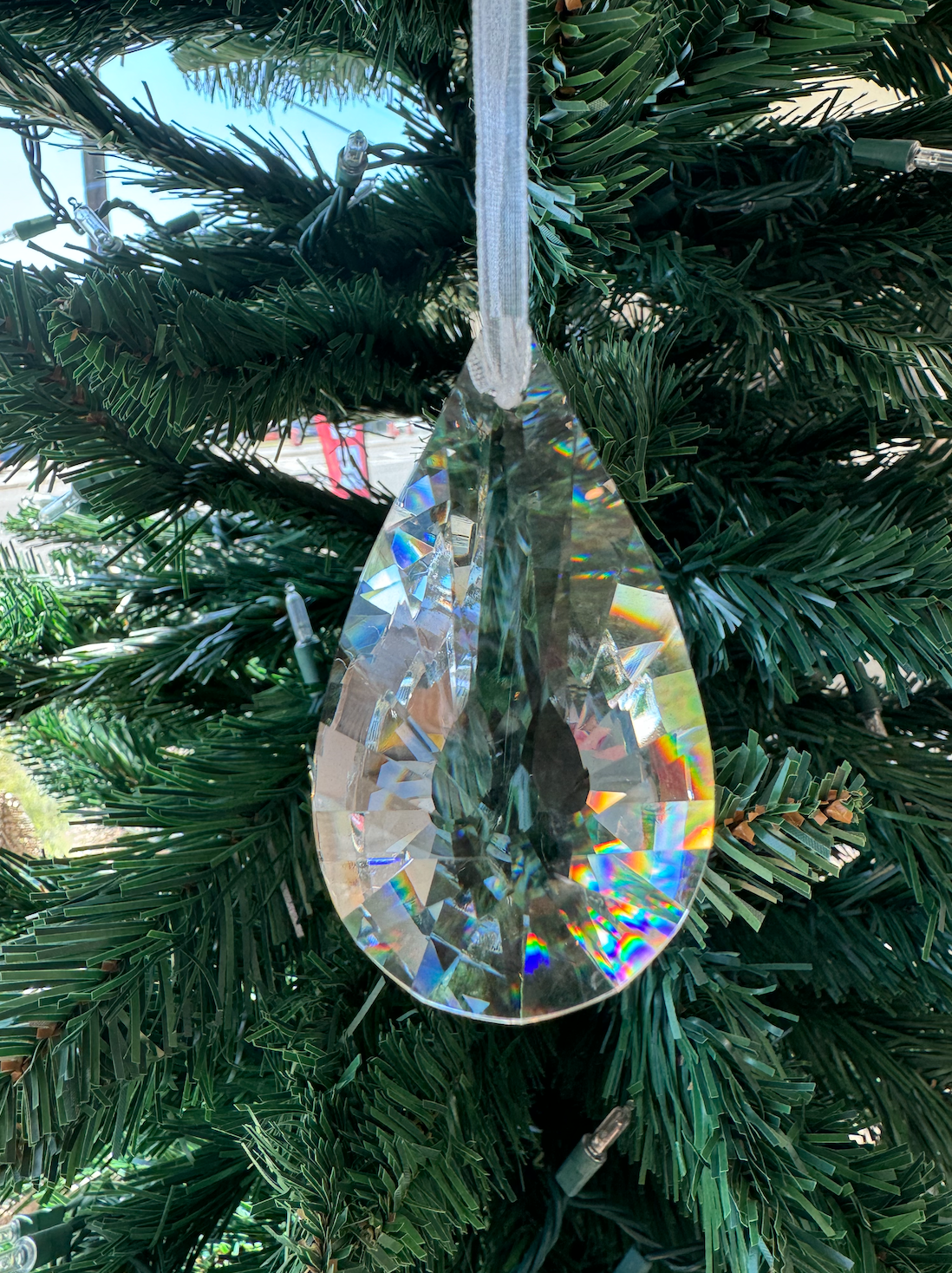This charming piece features a beautifully faceted crystal design that reflects light, adding a touch of elegance to your Christmas tree or seasonal displays. Its petite size makes it perfect for creating layered looks among other ornaments or for showcasing in smaller arrangements. With its sparkling finish and timeless appeal, this crystal drop ornament brings a delightful shimmer to your holiday celebrations, making every moment feel special!