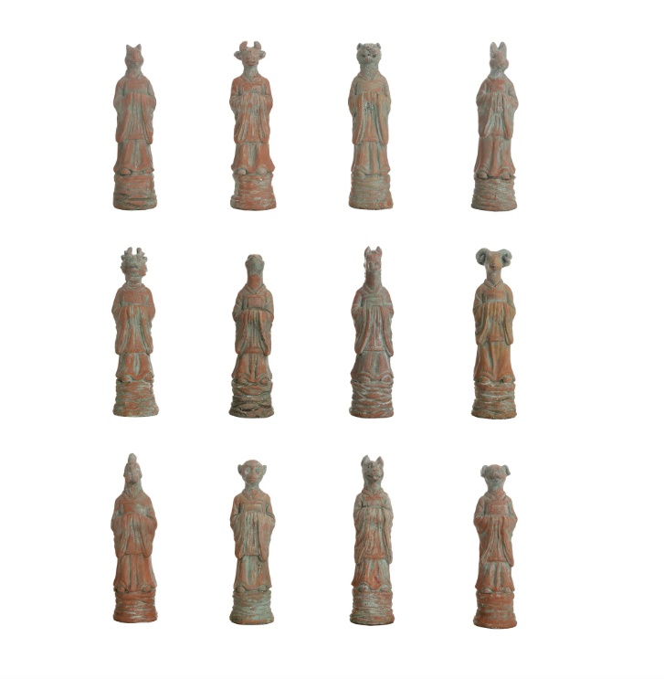 Terracotta finish figurines, each representing a different zodiac sign.